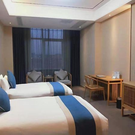 Feicheng Blossom Hotel Екстер'єр фото