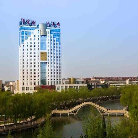 Feicheng Blossom Hotel Екстер'єр фото