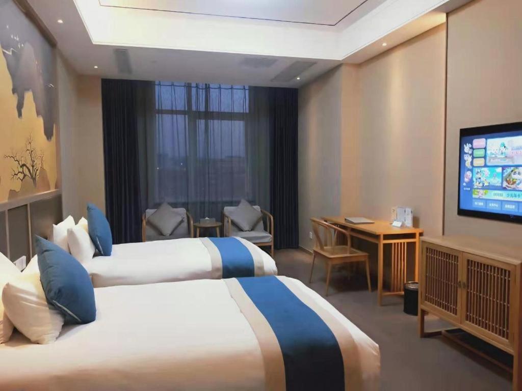 Feicheng Blossom Hotel Екстер'єр фото