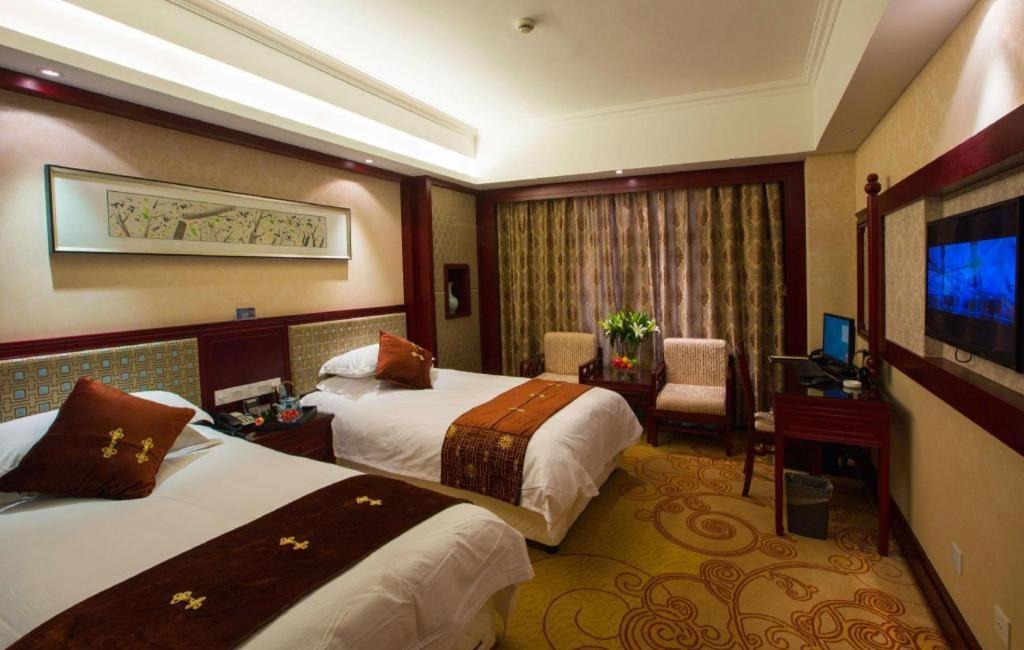 Feicheng Blossom Hotel Екстер'єр фото
