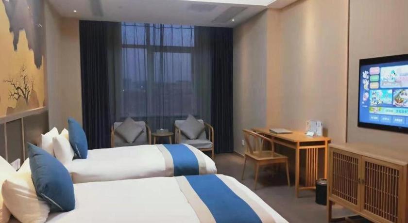 Feicheng Blossom Hotel Екстер'єр фото