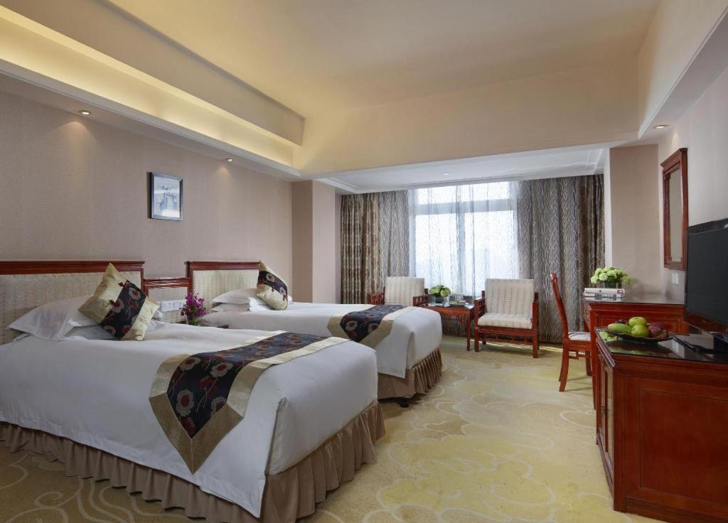 Feicheng Blossom Hotel Екстер'єр фото