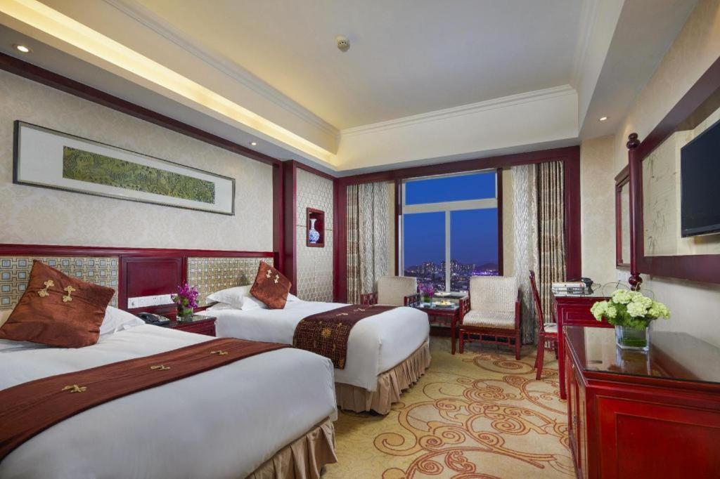 Feicheng Blossom Hotel Екстер'єр фото